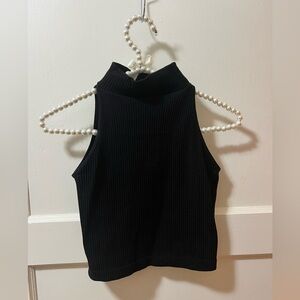 Black ribbed mock neck sleeveless crop top